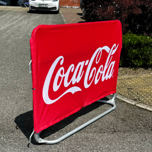 printed police met barrier jacket displaying coca cola logo